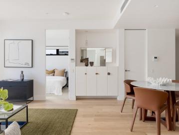 Top floor home of refined contemporary style in village address