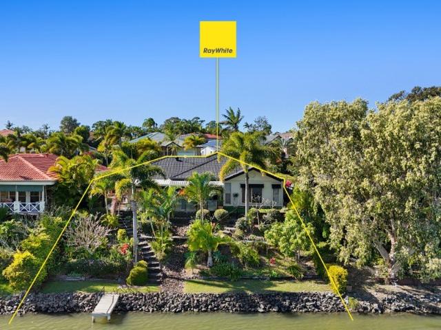 Wide Waterfront Living on Robina's Most Sought After Street