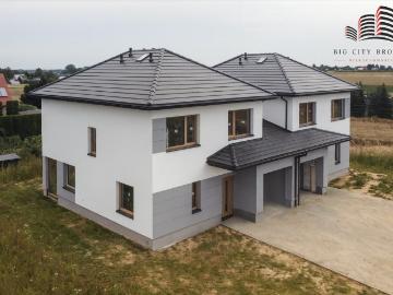 Funkcjonalny dom z pokojem na parterze, ogród, garaż