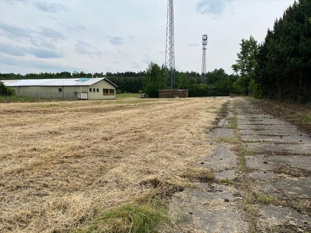 Przemysłowy teren 1000 m2 z budynkiem w centrum Wieliszewa