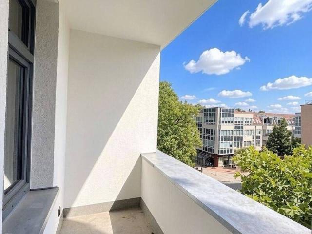 Wilhemsruh: Balkon | 1,5 Zi Neubauwohnung | Fußbodenheizung | |