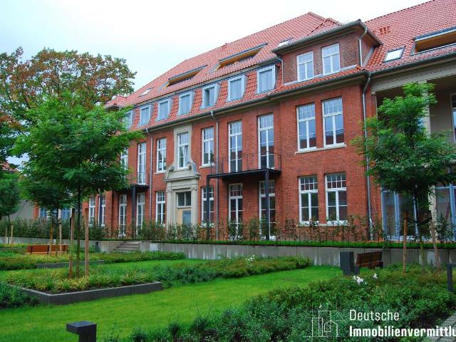 Willkommen im Quartier 21 Schöne 2 Zimmerwohnung mit Einbauküche, Terrasse und Garten
