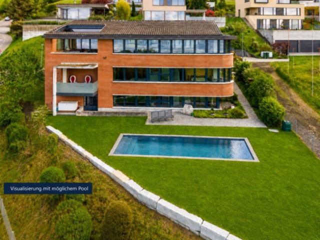 WO DER SEE ZUM PANORAMA WIRD EXKLUSIVES EINFAMILIENHAUS AUF GROSSZÜGIGEM GRUNDSTÜCK