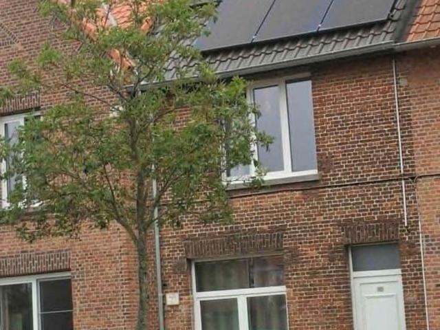 Woning met tuin, EPC B, 2 slpk,centraal gelegen