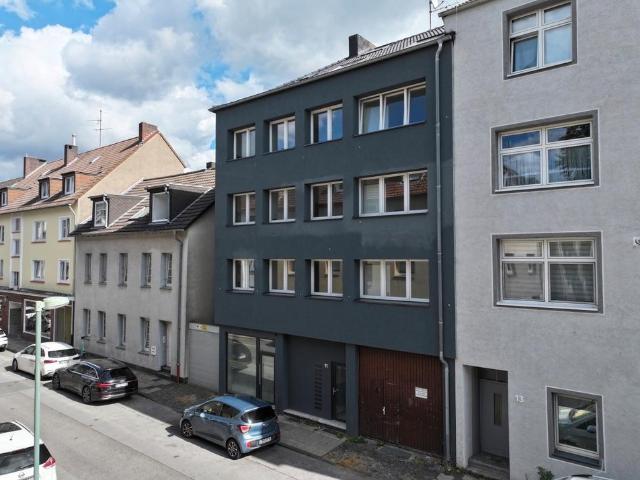 Wohn und Geschäftshaus mit 10 Wohnungen, Ladenlokal und Werkstat