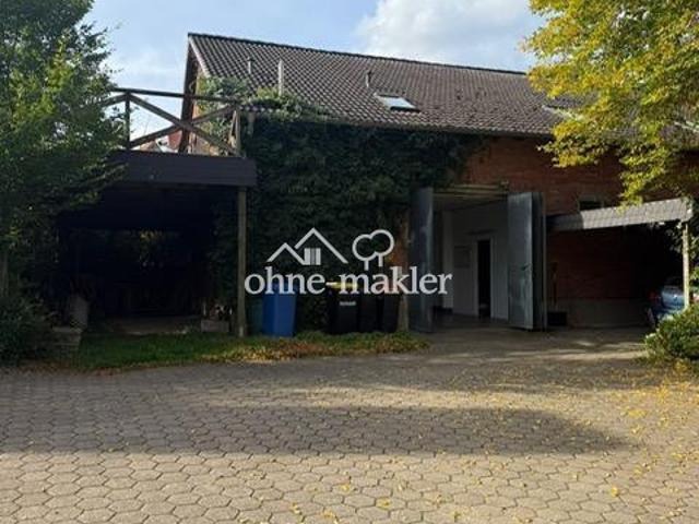 Wohn und Gewerbeimmobilie mit großzügiger Dachgeschosswohnung
