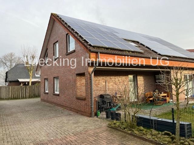 Wohngebäude mit 2 Wohneinheiten und PV Anlage