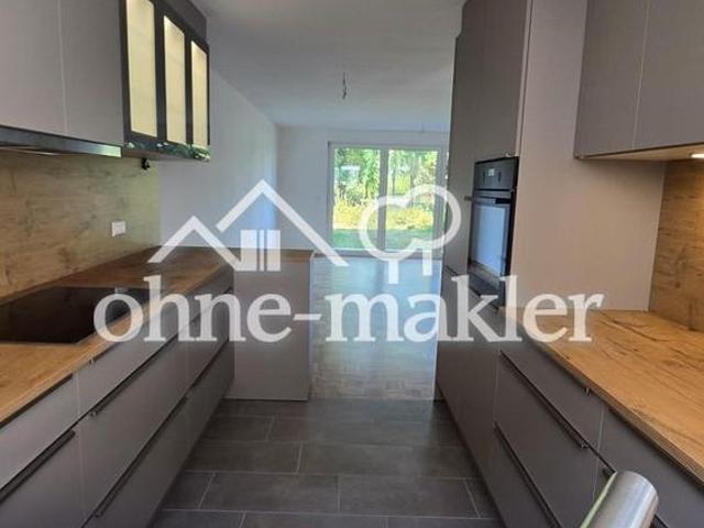 Wohnen am Bach Modernes Neubau Reihenhaus für die Familie mit Garten und Blick ins Grüne