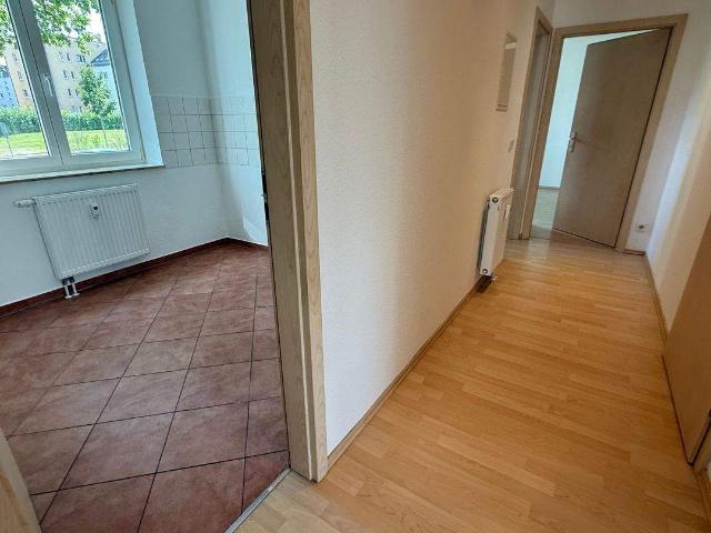 Wohnen am Heimgarten Blick auf Gartenanlag Bad mit Fenster