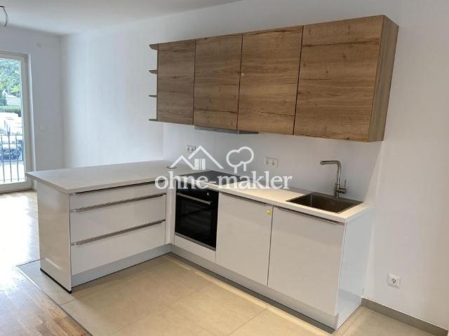 Wohnen am See in der Natur: Moderne Wohnung mit Balkon 1.OG