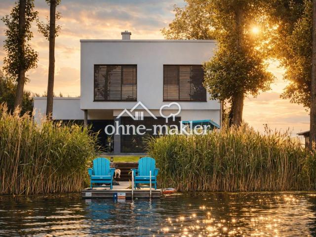Wohnen am Wasser Exklusives Architektenhaus in traumhafter Seelage!