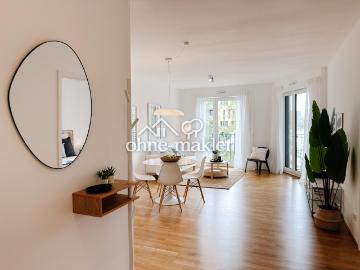 Wohnen am Wasser: Stilvolle 2 Zimmer Wohnung mit Balkon, Wasserblick und Tiefgarage