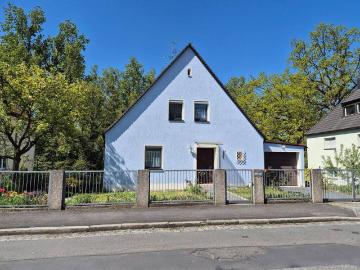 Wohnen am Wiesengrund gepflegtes Familienhaus mit Wintergarten und Gartenidylle