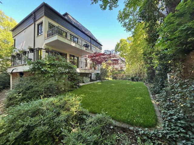 Wohnen an der Isar: 4 Zimmer Wohnung mit großzügigem Garten in Bogenhausen