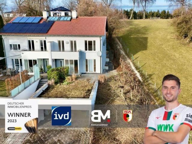 Wohnen auf mehreren Ebenen: Stilvolle Splitlevel Doppelhaushälfte mit Weitblick