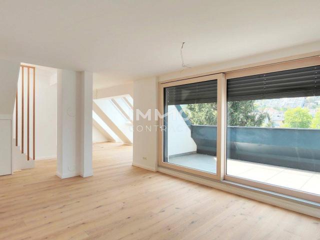 Wohnen auf höchstem Niveau – Einzigartige Dachgeschossresidenz mit Dachterrasse und Panoramablick