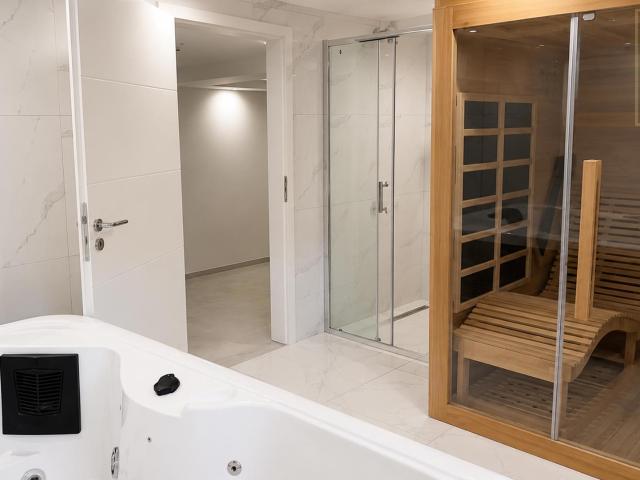 Wohnen auf höchstem Niveau – modernes Einfamilienhaus mit Wellness und Traumgarten
