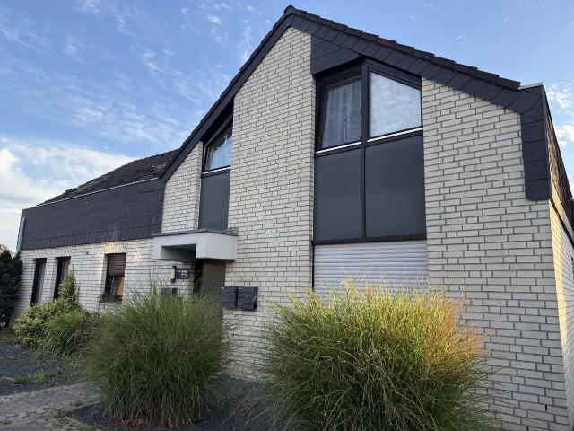 Wohnen auf zwei Ebenen – stilvolle Maisonette mit Privatgarten als attraktive Kapitalanlage
