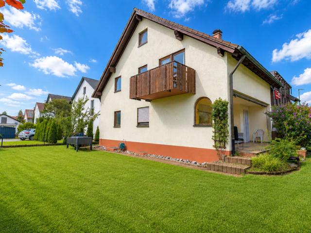 Wohnen auf zwei Etagen mit großzügigen Garten