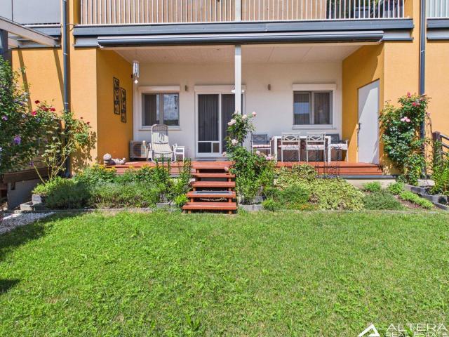 Wohnen im Grünen – Gartenwohnung mit Terrasse und 2 Carports!