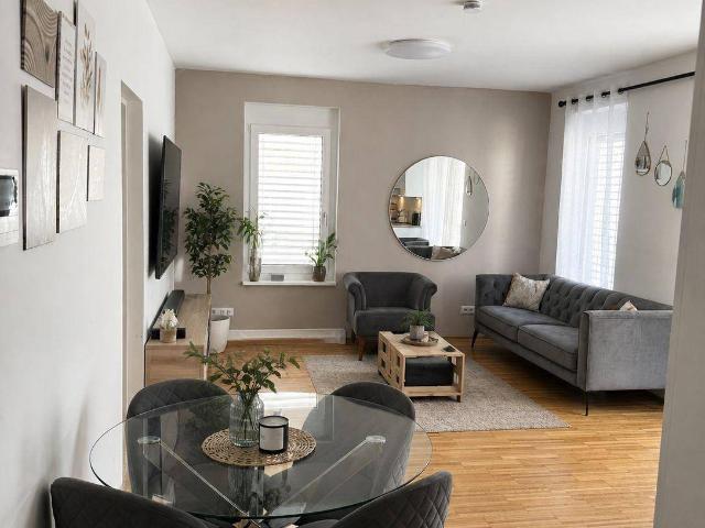 Wohnen im Grünen & Stadtnähe: Moderne 3 Zimmer Wohnung mit Balkon & Gemeinschaftsgarten