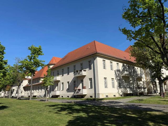 Wohnen im Denkmal – Charmante 2 Zimmer Wohnung im Ludwig Hoffmann Quartier