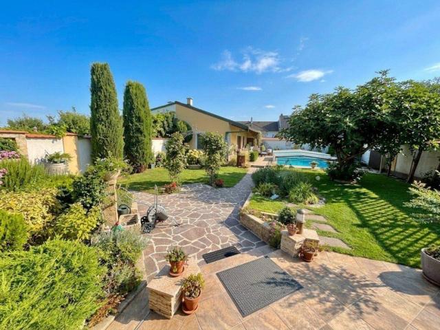 Wohnen in Seenähe – gepflegtes Einfamilienhaus mit Pool und Garten in Podersdorf