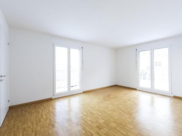 Wohnen inmitten einer einmaligen Bergkulisse mit einer Dachterrasse.