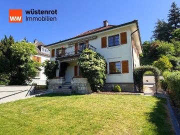 Wohnen mit Mehrwert: Gepflegtes Zweifamilienhaus in gefragter Lage mit Gartenidylle