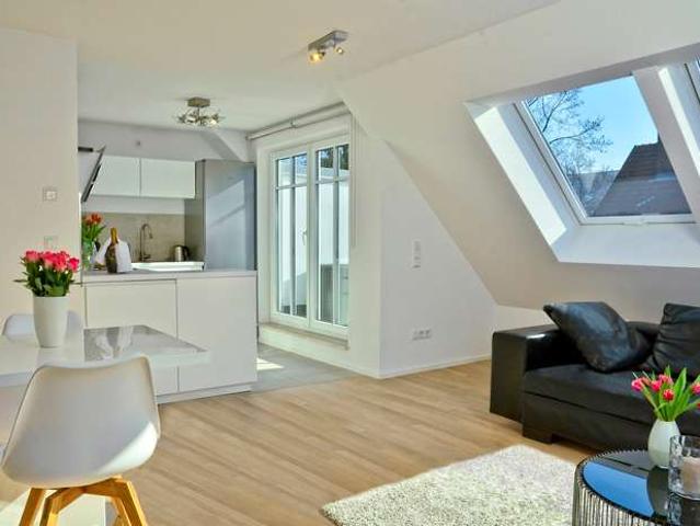 Wohnen mit Charakter: Charmante 3 Zi. Maisonette mit sonniger Süd Terrasse und Westbalkon
