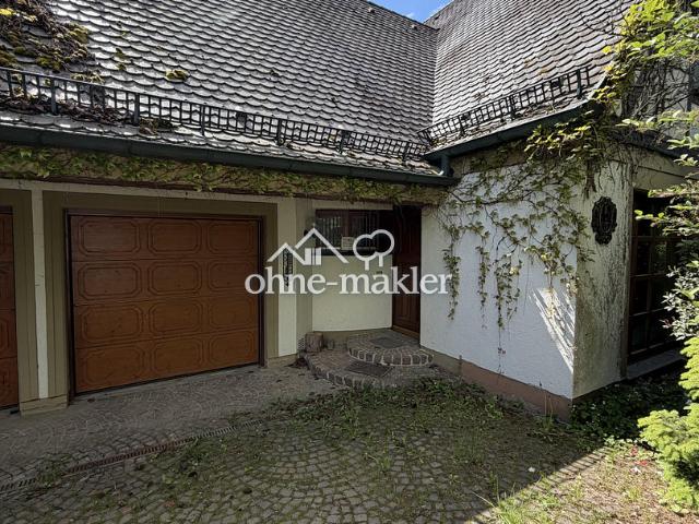 Wohnen mit Charakter: Charmantes Einfamilienhaus mit großem Garten & Kamin