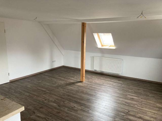 Wohnen mit Charakter: Ein Zimmer Wohnung im Dachgeschoss