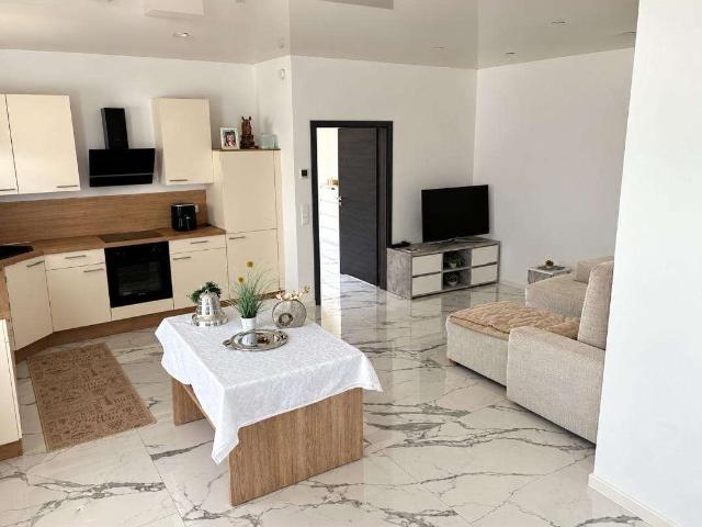 Wohnen mit Charakter: Neubau Apartment in Dennweiler Frohnbach
