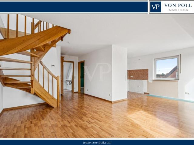 Wohnen mit Extra: Gemütliche 2 Zimmer Dachgeschosswohnung mit Loggia und Stellplatz