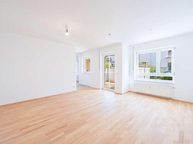 Wohnen mit Garten 4 Zimmer Eigentumswohnung mit Terrasse, Garten und zwei Stellplätzen