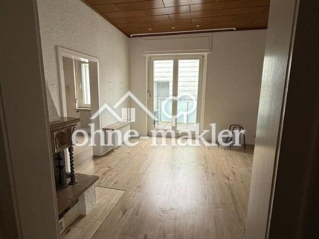 Wohnen mit Kamin, Terrasse und Garten – großzügige 3,5 Zimmer Wohnung in Solingen