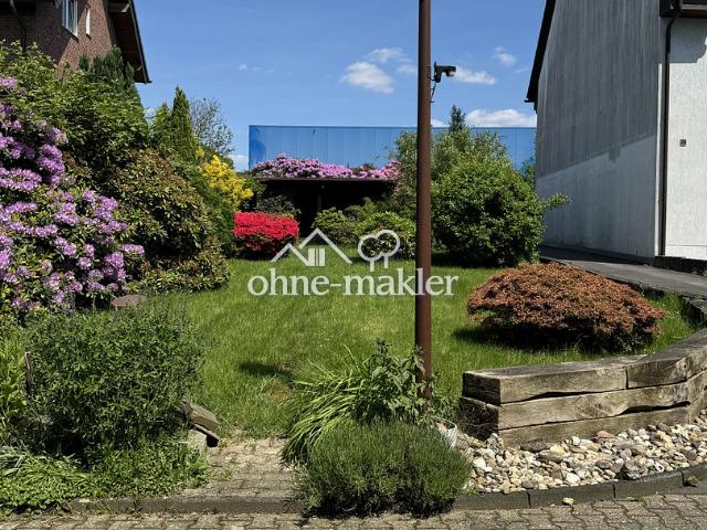 Wohnen mit Kamin, Terrasse und Garten – großzügige 3,5 Zimmer Wohnung in Solingen