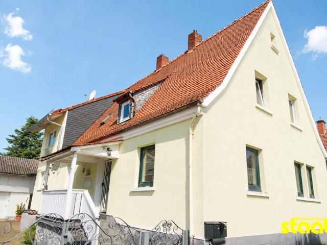 Wohnen mit Perspektive – Siedlungshaus mit Nebengebäude und Grundstück