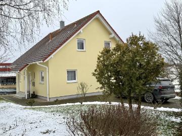 Wohnen mit Stil und Komfort Einfamilienhaus mit Wintergartenflair