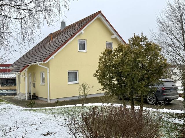 Wohnen mit Stil und Komfort Einfamilienhaus mit Wintergartenflair