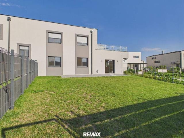 Wohnen mit Urlaubsfeeling: ETW mit Terrasse, Garten & Badeteichzugang