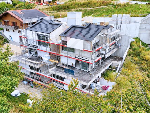 Wohnen mit Weitsicht moderne 4.5 Zimmer Villen in Plasselb