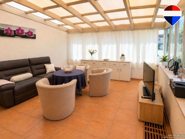 Wohnen mit Wohlfühlfaktor – Einliegerwohnung mit Wintergarten und Terrasse
