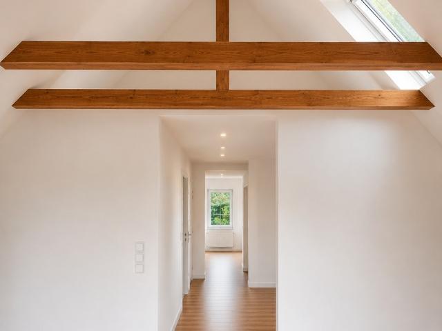 Wohnen wie im eigenen Haus – Exklusive Maisonettewohnung am Wald mit großer Sonnenterrasse