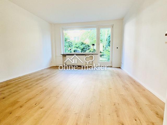 Wohnen wie im eigenen Haus – renovierte 3 Zimmer Wohnung mit großer Terrasse & Garten