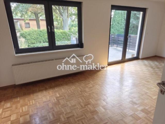 Wohnen wie im Haus: sanierte 3 Zimmer Wohnung mit Kamin, Südterrasse, Garten & Tiefgarage
