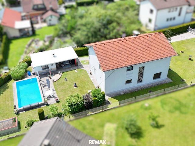 Wohnen wie im Urlaub: Haus mit Pool, viel Grün & Privatsphäre in Ebenthal