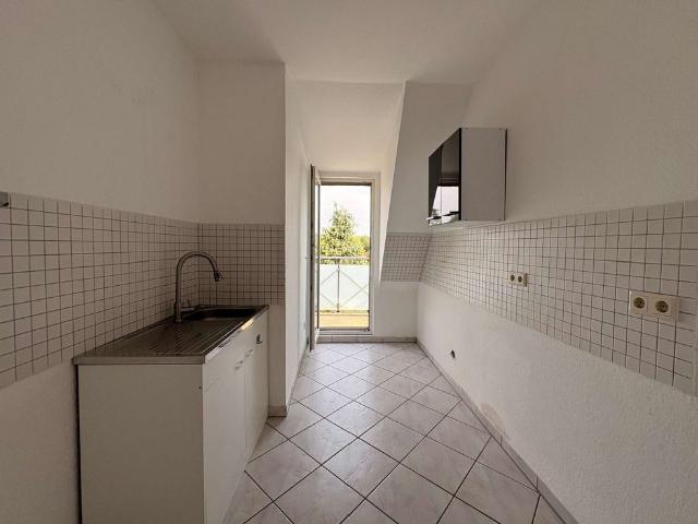 Wohnen über den Dächern: 3 Zimmer DG Wohnung mit Balkon!