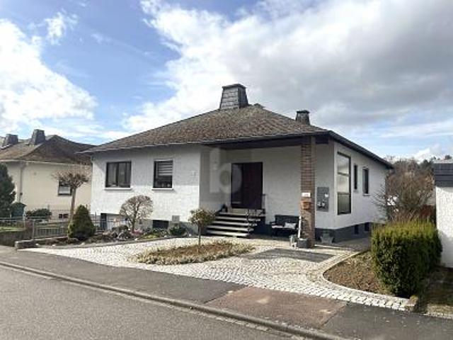 WOHNERLEBNIS MIT WINTERGARTEN UND GARTENPARADIES