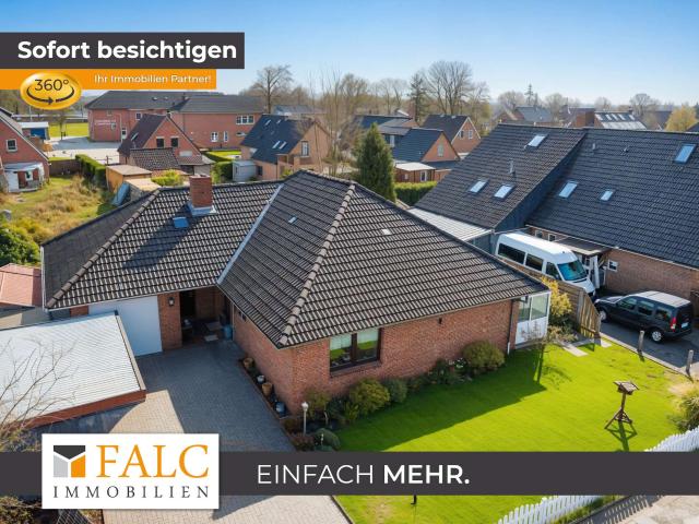 Wohnkomfort auf einer Ebene: Gepflegter Bungalow mit großem Garten in Burhafe
